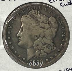 1899-O Morgan Silver Dollar- Mint Error Retained Die Cud on Mint Mark