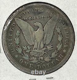 1899-O Morgan Silver Dollar- Mint Error Retained Die Cud on Mint Mark