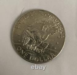 1974 Eisenhower Silver Dollar No Mint Mark Not Graded. Very Good Condition