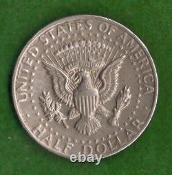 1974 U. S Kennedy Half Dollar NO MINT MARK (NICE COIN)