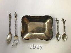 Lot of Peruvian silver spoons and fork and one hand-hammered marked silver dish