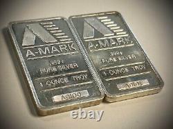 Set of 2 A-Mark Precious Metals Flat 1oz. 999+ Pure Silver Bar Lot A0100 & A0101