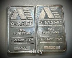 Set of 2 A-Mark Precious Metals Flat 1oz. 999+ Pure Silver Bar Lot A0100 & A0101